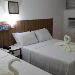Postel nebo postele na pokoji v ubytování Panorama Hotel