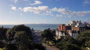 a view of a city with the ocean in the background at Russell Court Hotel in Bournemouth