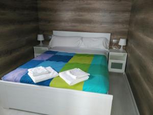 Łóżko lub łóżka w pokoju w obiekcie Camping Riaza
