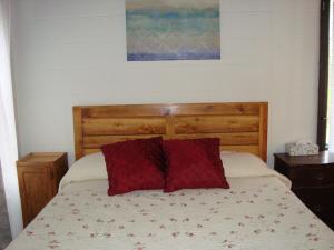 מיטה או מיטות בחדר ב-Husky House