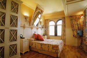 Posteľ alebo postele v izbe v ubytovaní Hotel Juan Carlos I