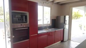 Η κουζίνα ή μικρή κουζίνα στο Villa Taho