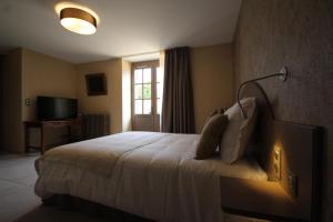 Llit o llits en una habitació de Chambre D’hôtes Parc Johan