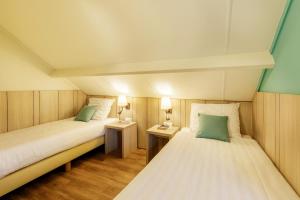 Postel nebo postele na pokoji v ubytování Center Parcs Les Ardennes