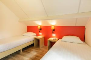 Postel nebo postele na pokoji v ubytování Center Parcs Les Ardennes