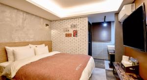 TV a/nebo společenská místnost v ubytování Ulsan Hotel 109