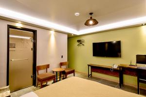 TV a/nebo společenská místnost v ubytování Ulsan Hotel 109