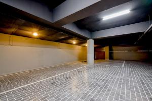 a empty room with a tiled floor in a building at Ulsan Hotel 109 in Ulsan