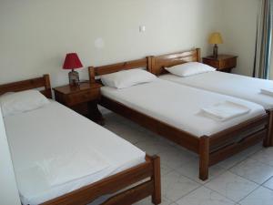 Un pat sau paturi într-o cameră la Filoktitis