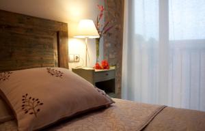 A bed or beds in a room at Can 28