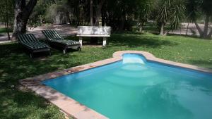 Der Swimmingpool an oder in der Nähe von Mukuku Rest Camp