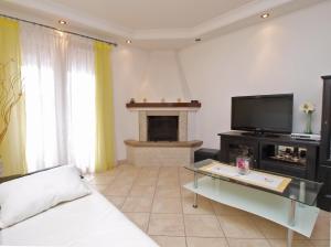 TV a/nebo společenská místnost v ubytování Apartments Milan 1048