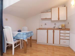 Kuchyň nebo kuchyňský kout v ubytování Apartments Milan 1048