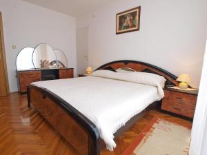 Postel nebo postele na pokoji v ubytování Apartments Milan 1048