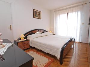 Postel nebo postele na pokoji v ubytování Apartments Milan 1048