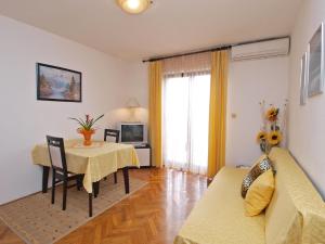 TV a/nebo společenská místnost v ubytování Apartments Milan 1048