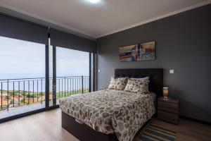 Ένα ή περισσότερα κρεβάτια σε δωμάτιο στο Casa do Louro