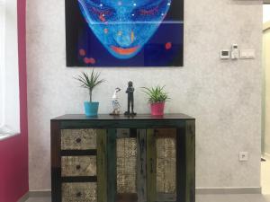 a table with some plants on top of it at Diana&rsquo;s Charming Studio at the Buda Castle in Budapest