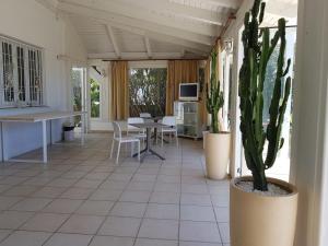 Телевизор и/или развлекательный центр в La Giara Resort
