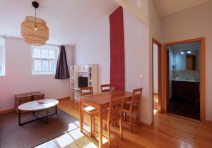 Μια τηλεόραση ή/και κέντρο ψυχαγωγίας στο Aparthotel Oporto Entreparedes