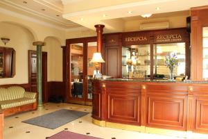 a large room with a large counter and a large window at Luxury Garni Hotel Brix in Bratislava