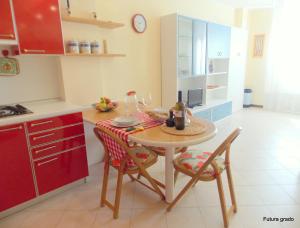 A kitchen or kitchenette at Residence Eleonora Még 5 kép