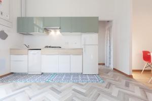 Kuchyňa alebo kuchynka v ubytovaní Saragozza Apartments