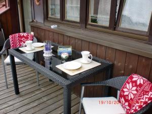 Ein Balkon oder eine Terrasse in der Unterkunft Alpenflair Ferienwohnungen Whg 214 "Schanzenblick"
