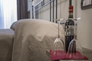 Postel nebo postele na pokoji v ubytování Borgomaestro B&B