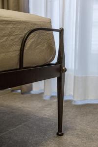 Postel nebo postele na pokoji v ubytování Borgomaestro B&B