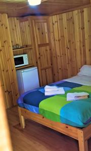 Łóżko lub łóżka w pokoju w obiekcie Camping Riaza