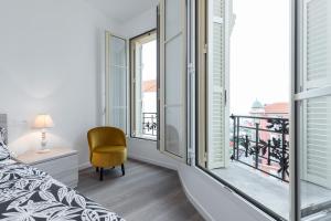 Łóżko lub łóżka w pokoju w obiekcie Monte Carlo View
