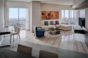 a living room with a couch and a table at Hyatt Regency Creek Heights Residences in Dubai +30 photos