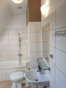 Kúpeľňa v ubytovaní Pokoje Gościnne Trebunia + 13 fotografií