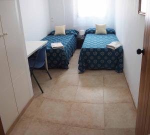 Posteľ alebo postele v izbe v ubytovaní Villa Capricho de Luna