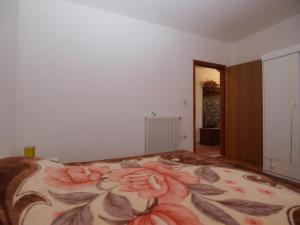 Postel nebo postele na pokoji v ubytování Apartment Luisa 1437