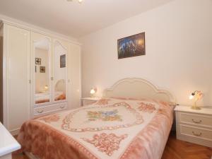 Postel nebo postele na pokoji v ubytování Apartment Luisa 1437