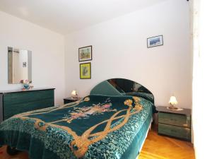 Postel nebo postele na pokoji v ubytování Apartment Luisa 1437