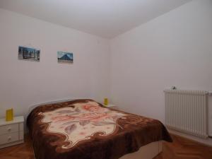 Postel nebo postele na pokoji v ubytování Apartment Luisa 1437