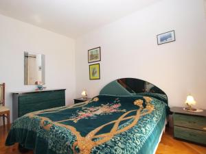 Postel nebo postele na pokoji v ubytování Apartment Luisa 1437