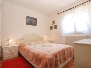 Postel nebo postele na pokoji v ubytování Apartment Luisa 1437