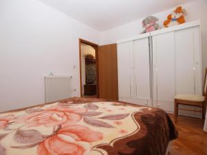 Postel nebo postele na pokoji v ubytování Apartment Luisa 1437