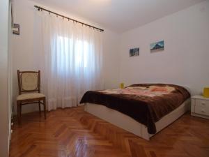 Postel nebo postele na pokoji v ubytování Apartment Luisa 1437