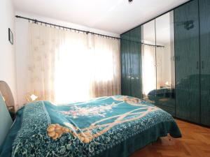 Postel nebo postele na pokoji v ubytování Apartment Luisa 1437