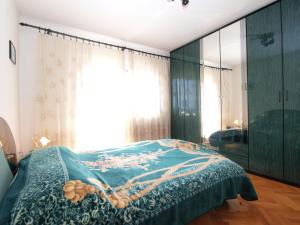 Postel nebo postele na pokoji v ubytování Apartment Luisa 1437