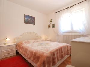 Postel nebo postele na pokoji v ubytování Apartment Luisa 1437
