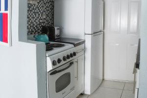 A kitchen or kitchenette at Suite Love