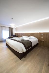 Postel nebo postele na pokoji v ubytování Hotel Le Fournil