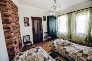 Postel nebo postele na pokoji v ubytování Casa de Khasia