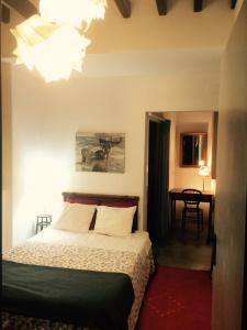 Postel nebo postele na pokoji v ubytování Barrio Boutik Hostal long stays
